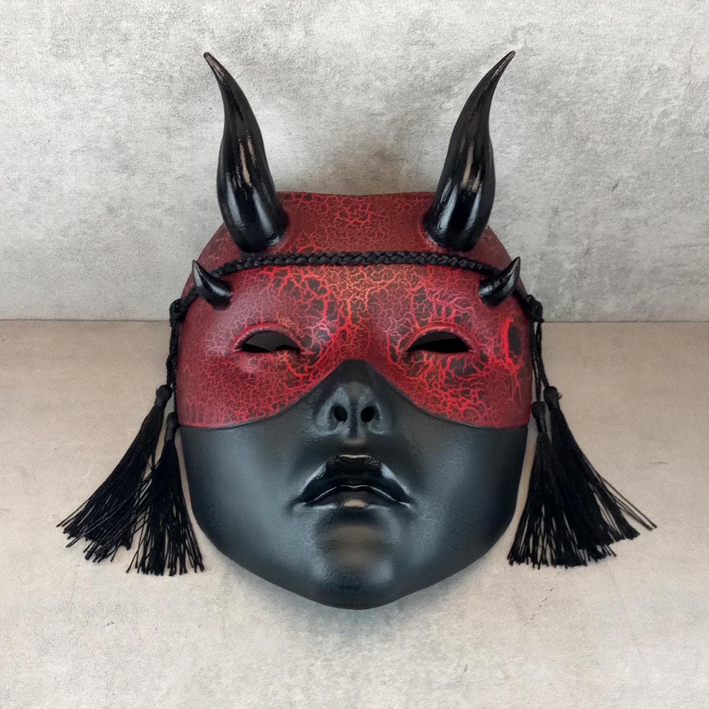 Red and Black Cracked Geisha Witch Mask with Shiny Black Horns