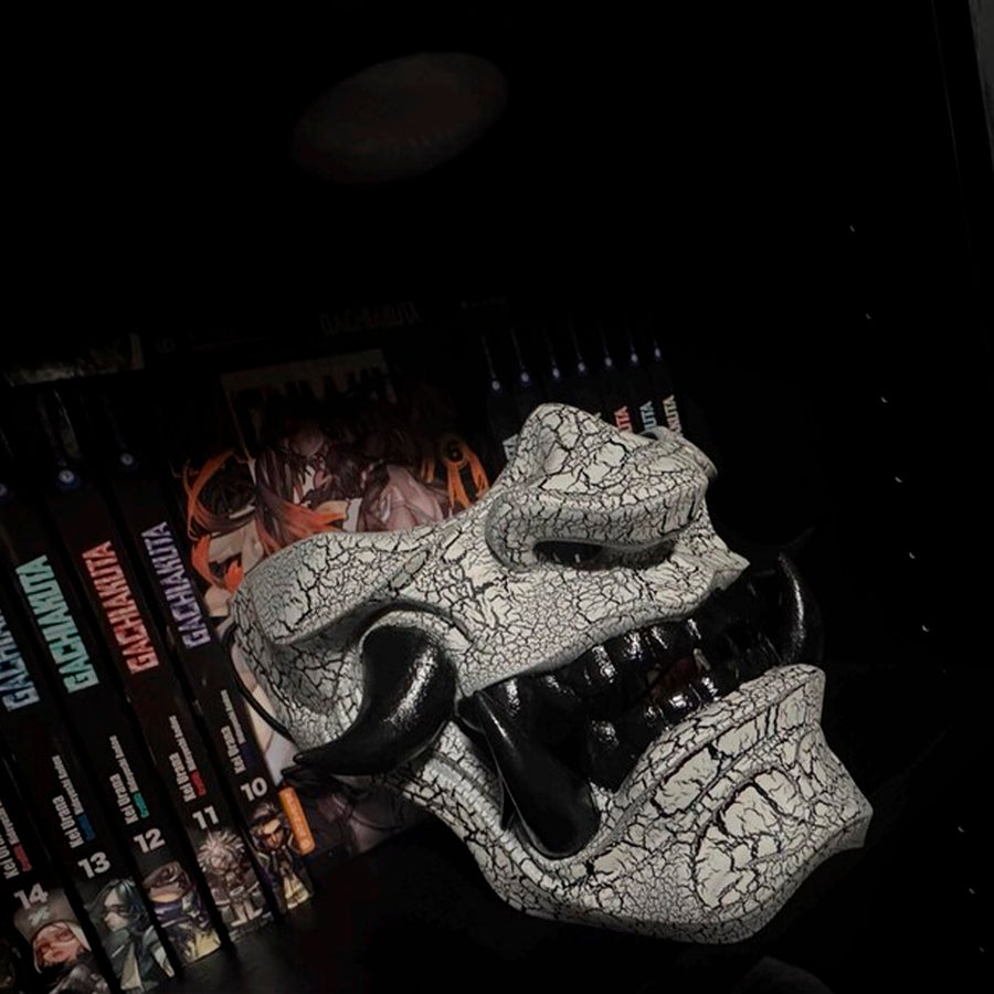 Black and white cracked samurai mask with black fangs