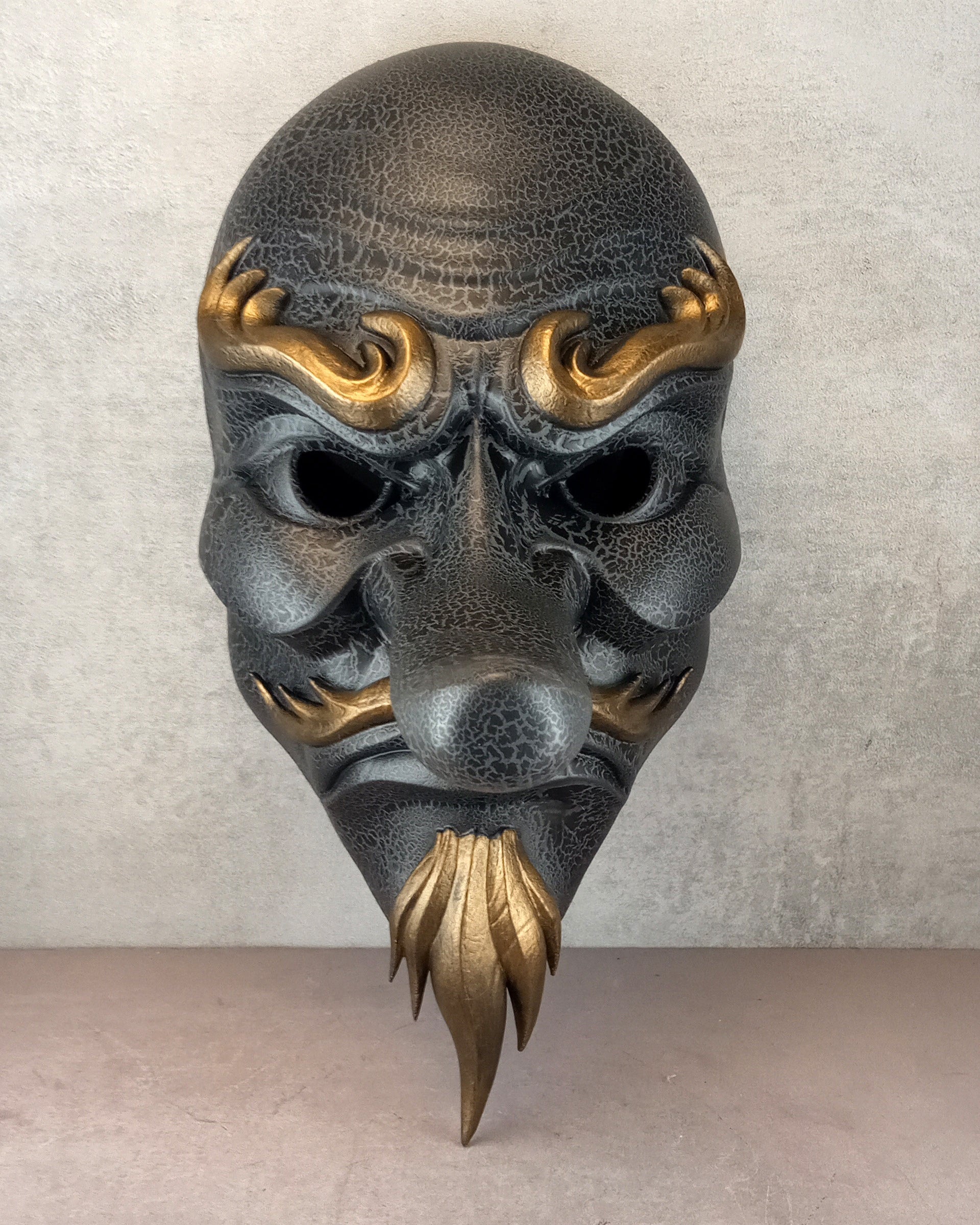 Gray cracked Tengu mask