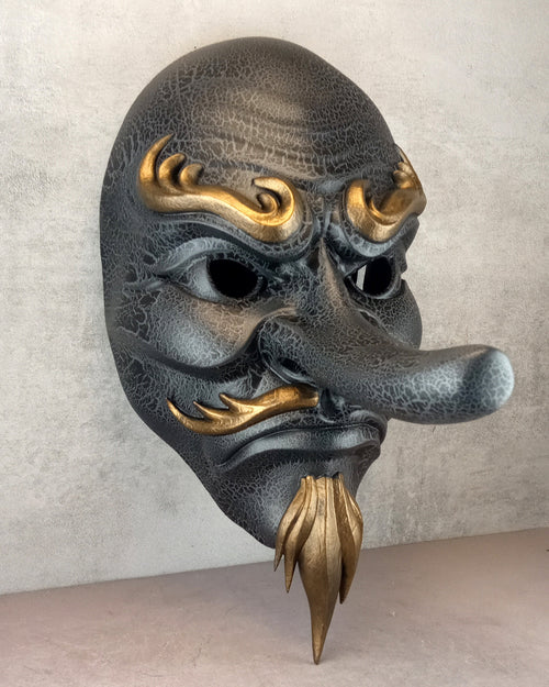 Gray cracked Tengu mask