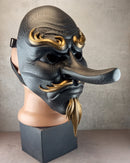 Gray cracked Tengu mask