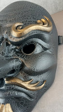 Gray cracked Tengu mask