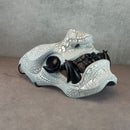 Black and white cracked samurai mask with black fangs