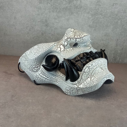 Black and white cracked samurai mask with black fangs