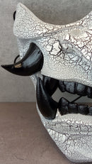 Black and white cracked samurai mask with black fangs