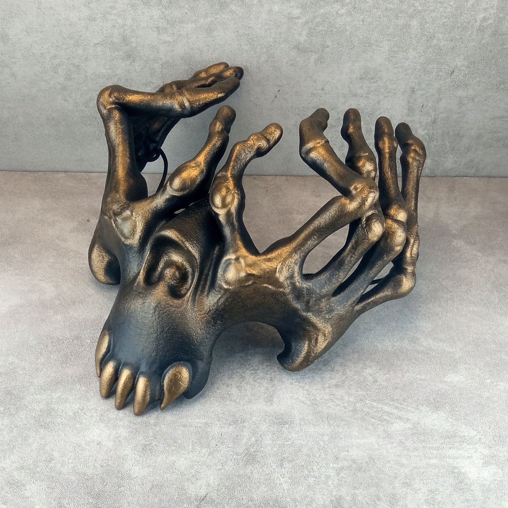 Skeleton Hands Mask – Black with Bronze Accents