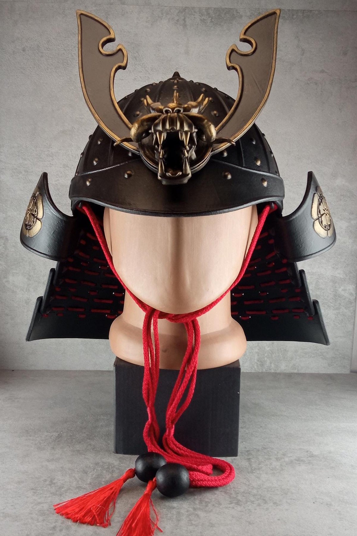 Samurai Kabuto Helmet – Black with Bronze Dragon Crest and Red Cord, with Menpo or Somen Face Mask
