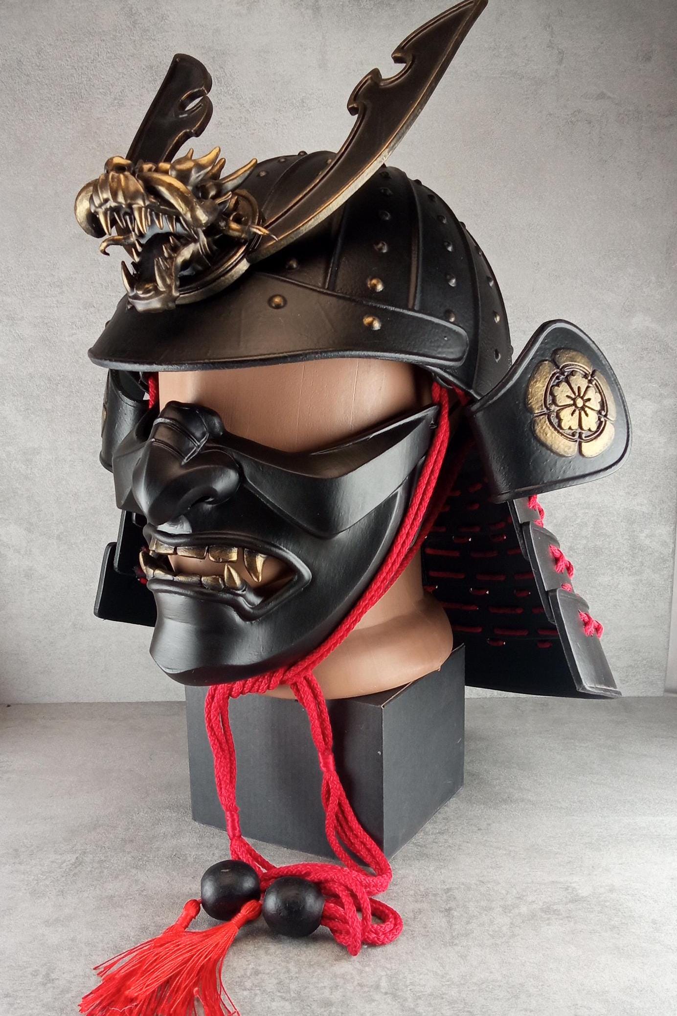 Samurai Kabuto Helmet – Black with Bronze Dragon Crest and Red Cord, with Menpo or Somen Face Mask