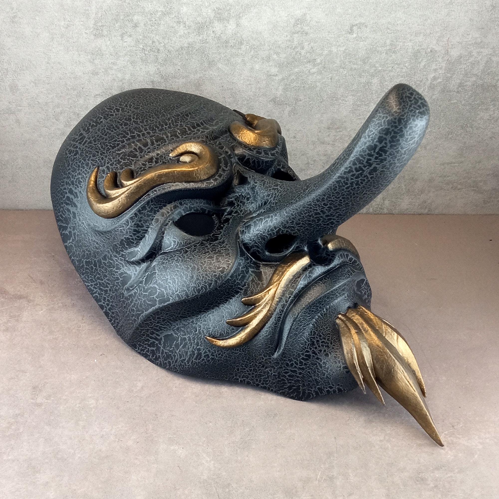 Gray cracked Tengu mask