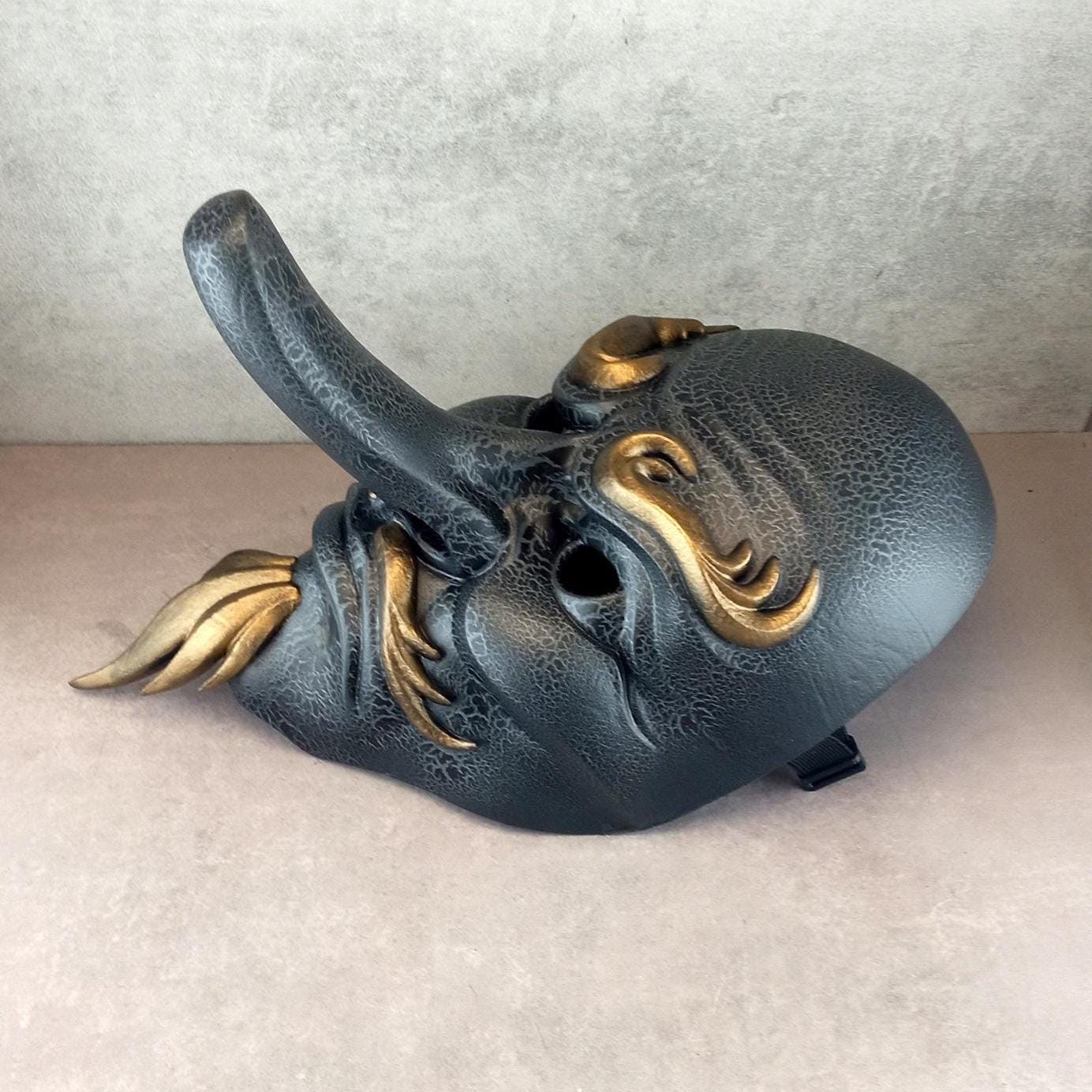 Gray cracked Tengu mask