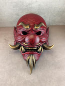 Red Cracked Tengu Demon Mask with Golden Fangs