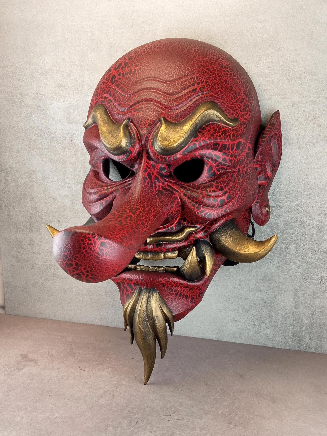 Red Cracked Tengu Demon Mask with Golden Fangs